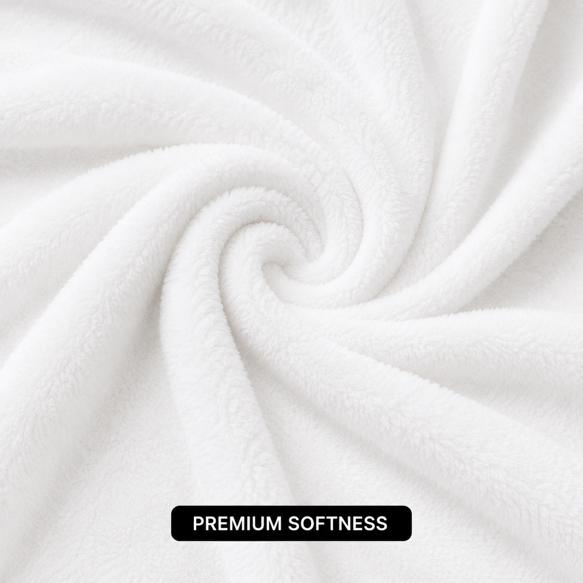 White minky-touch blanket close-up labeled Premium Softness